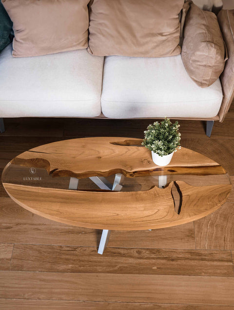 Ovaler Couchtisch Incanto aus Akazienholz mit glasklarem Epoxidharz