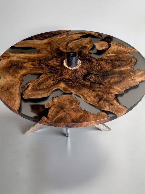 Round dining table from walnut root with smoky matte resin Amara